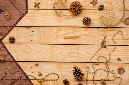 A top view of Christmas decorations on a wooden texture - perfect for background or wallpaper