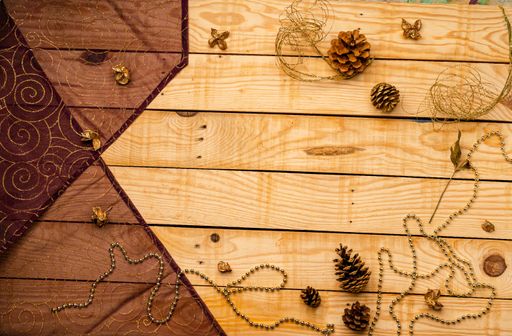 A top view of Christmas decorations on a wooden texture - perfect for background or wallpaper