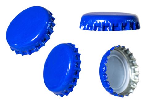 A closeup shot of different sides of a blue metal bottle cap isolated on white background