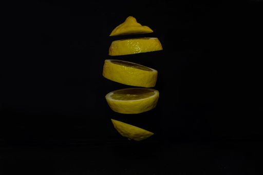 A closeup shot of slices of lemon on an isolated background