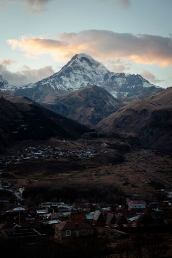 A bird's-eye view of the village of Stepantsminda at the foot of Mount Kazbek in Georgia