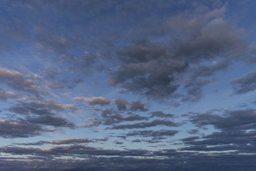 A low angle shot of a beautiful cloudy sky