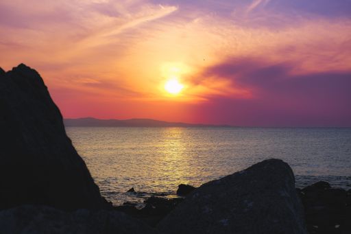 A beautiful shot of a bright sunset sky over the shore of Molyvos,Lesvos,Greece