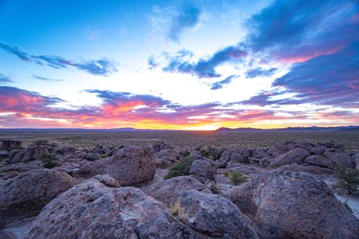 A beautiful view of the dramatic sunset over the rocks in New Mexico, USA