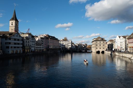 A beautiful view of the historical buildings on the shore of the river in Zurich, Switzerland