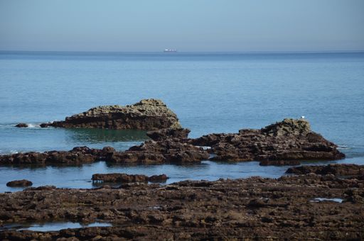 A closeup shot of low tide at the coast of Biarritz in the Bay of Biscay, France