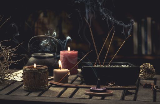 A wooden rustic aroma set with sticks and candles