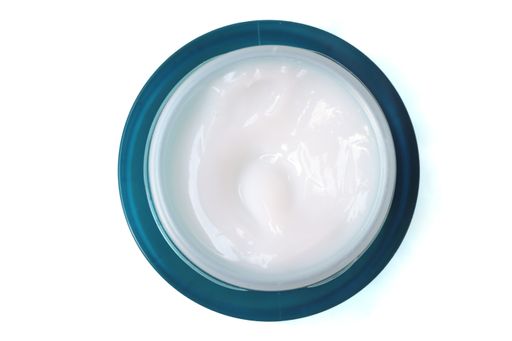 A top view shot of a cream jar in the white background