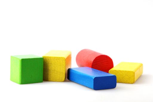 A closeup shot of colorful toy blocks isolated on a white background