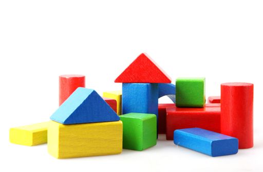 A closeup shot of colorful toy blocks isolated on a white background