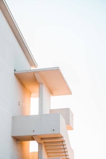 Sunlit staircase outside a building at sunset in Le Lavandou, France