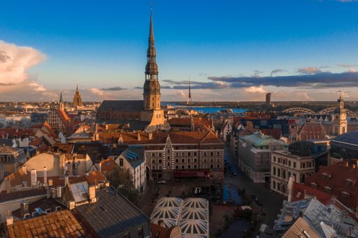 A beautiful panoramic shot of the St. Peters Cathedral during sunset in Riga, Latvia