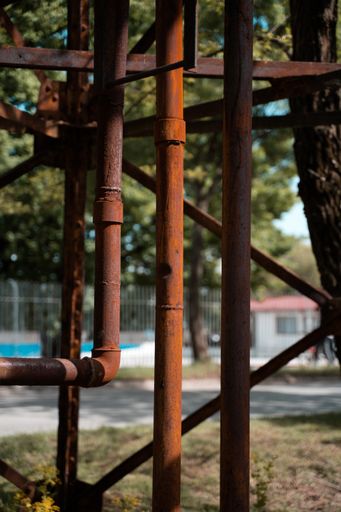 A vertical shot of rusty metals and pipes