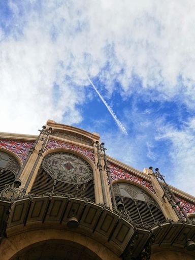 A beautiful vertical low angle shot of the Central Market in Valencia, Spain