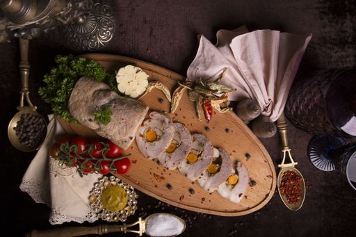 A high angle shot of beef roll made with vegetables and seasonings