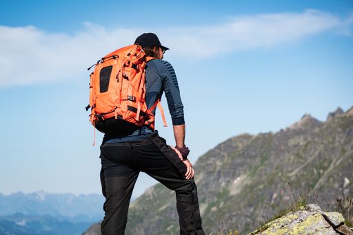 A view of a German man stopping for a breath in the middle of a hike