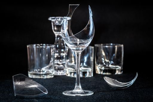 A closeup shot of a shattered wine glass