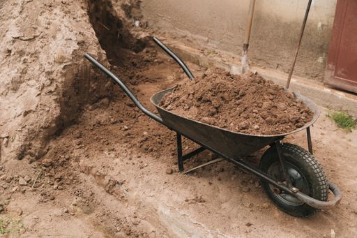 A wheelbarrow full of soil
