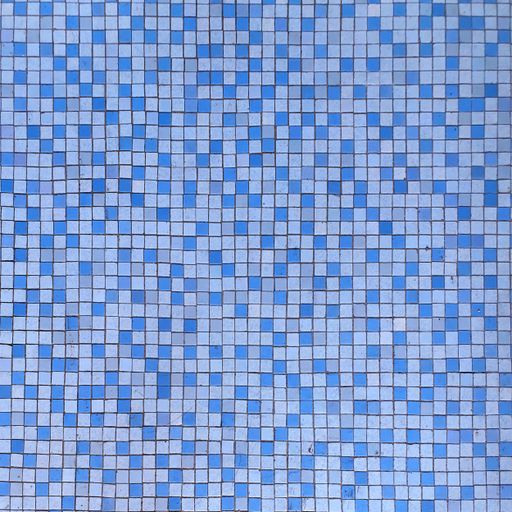 The blue mosaic tiles of a swimming pool for backgrounds and overlays