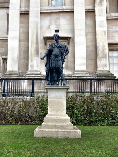 A vertical of the bronze statue of James II in National Gallery garden in Trafalgar Square, London, UK