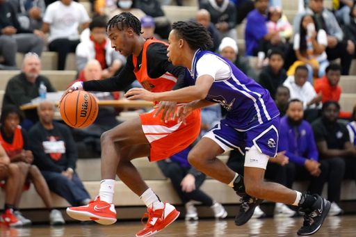 The young male players on the court at a fall Merrillville high school basketball game