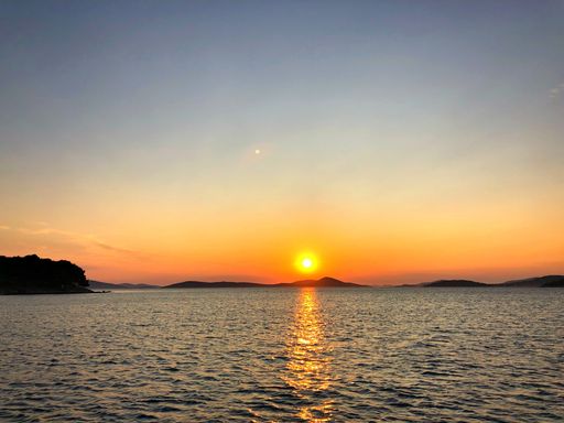 A mesmerizing sunset over the wavy sea