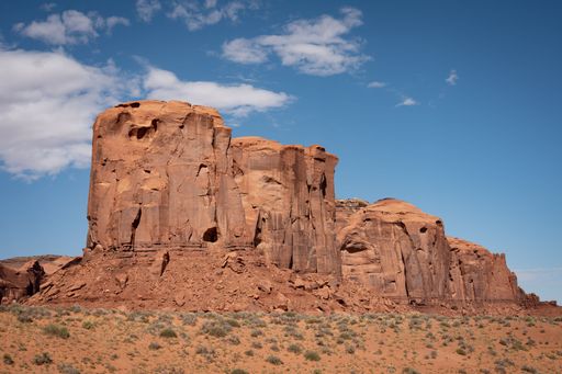 An aerial view of desert landscape with rock formations