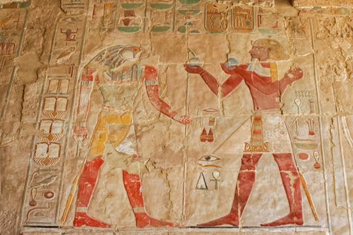 Horus colored Egyptian hieroglyphs from Mortuary Temple of Hatshepsut close to Luxor City (Egypt)
