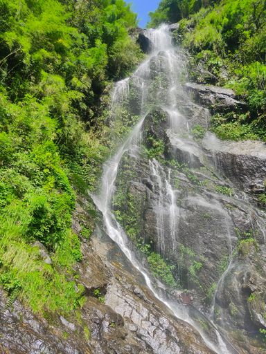 A beautiful waterfall from the green mountain