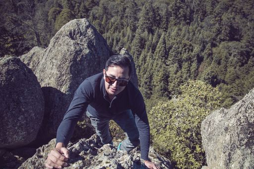 A rock climber in Penas Cargadas Ecotourism Park, Hidalgo Real del Monte, Mexico