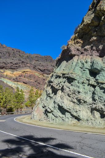 A vertical shot of the view of the rocks near the road at Gran Canaria, Los Azulejos, during daylight