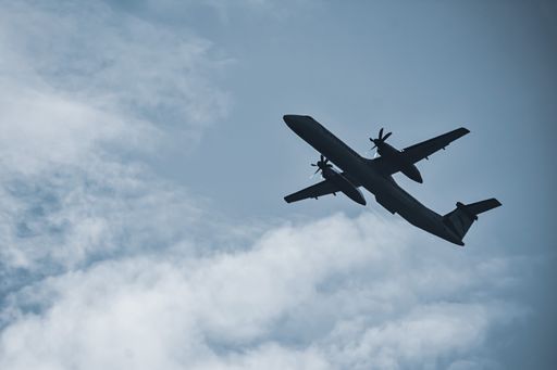 A low angle shot of a plane in flight