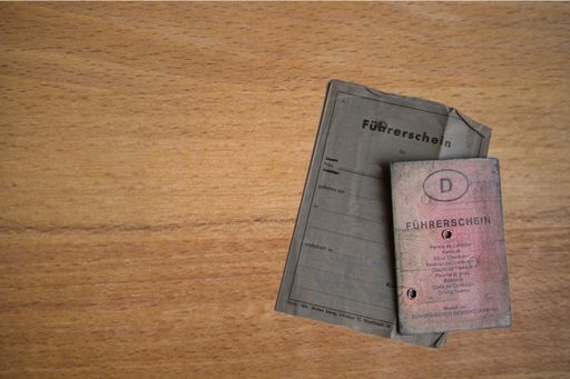 Germany, old used, dirty pink and grey German driving license