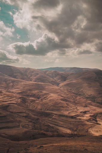 Beautiful shot rocky mountains and hills with cloudy sky