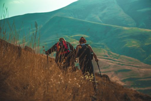 Group of hikers on beautiful mountains and hills