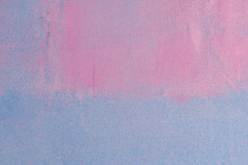 A closeup shot of a painted pink blue wall for backgrounds