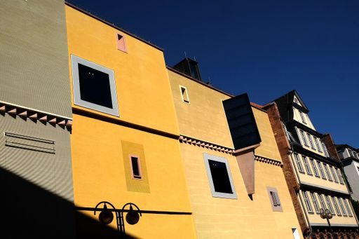 A modern residential houses under a clear blue sky background