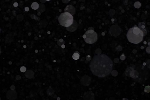 Snow Falling on Black Background on a Cold Winter Night