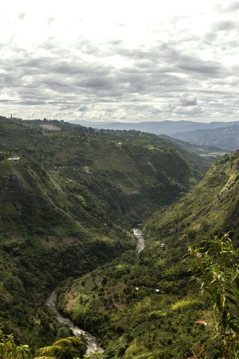 A beautiful view of a mountain chain from the highest point on a cloudy day