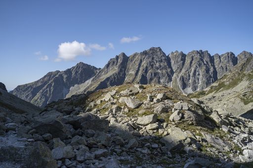 A beautiful scenery of rocky mountains under the blue sky - grat for a wallpaper
