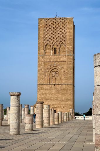 People visiting the Hassan Tower and the columns in Rabat, Morocco