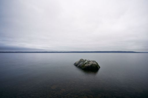 An aerial view of a rock formation in Lake Mjosa, Norway