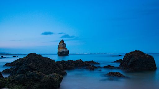 A beautiful shot of a rocky sea in Algarve, Portugal