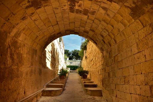 Arched vault tunnel, built by globigerina limestone slabs in Floriana, Maltese Islands. Excellent Maltese masonry work, using Malta's sedimentary rock