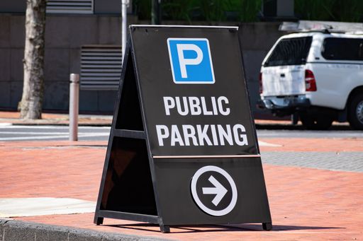 View of public parking sandwich board
