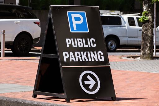 View of public parking sandwich board