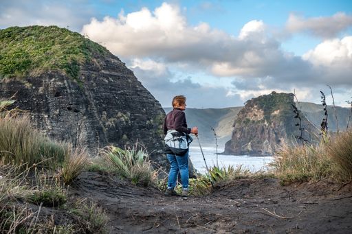 Auckland / New Zealand - January 2 2020: View of tourist walking at Comans Track