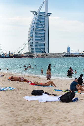Dubai,UAE / 15 november. 2019 : people enjoying the Jumeirah Beach in Dubai witch is a white sand beach that is located and named after