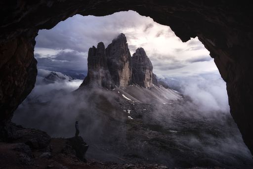 The clouds over and around a rock in Dolomites, Alps, South Tyrol, Italy