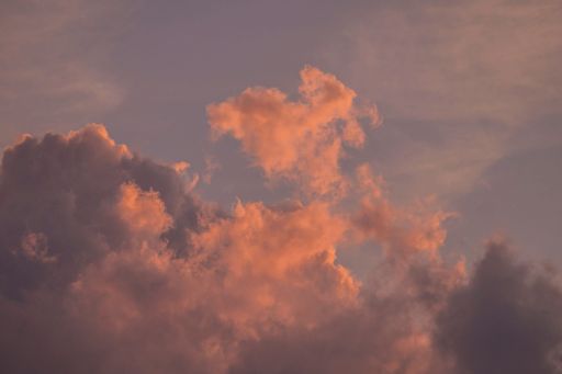 A beautiful view of a pink cloudy sky.